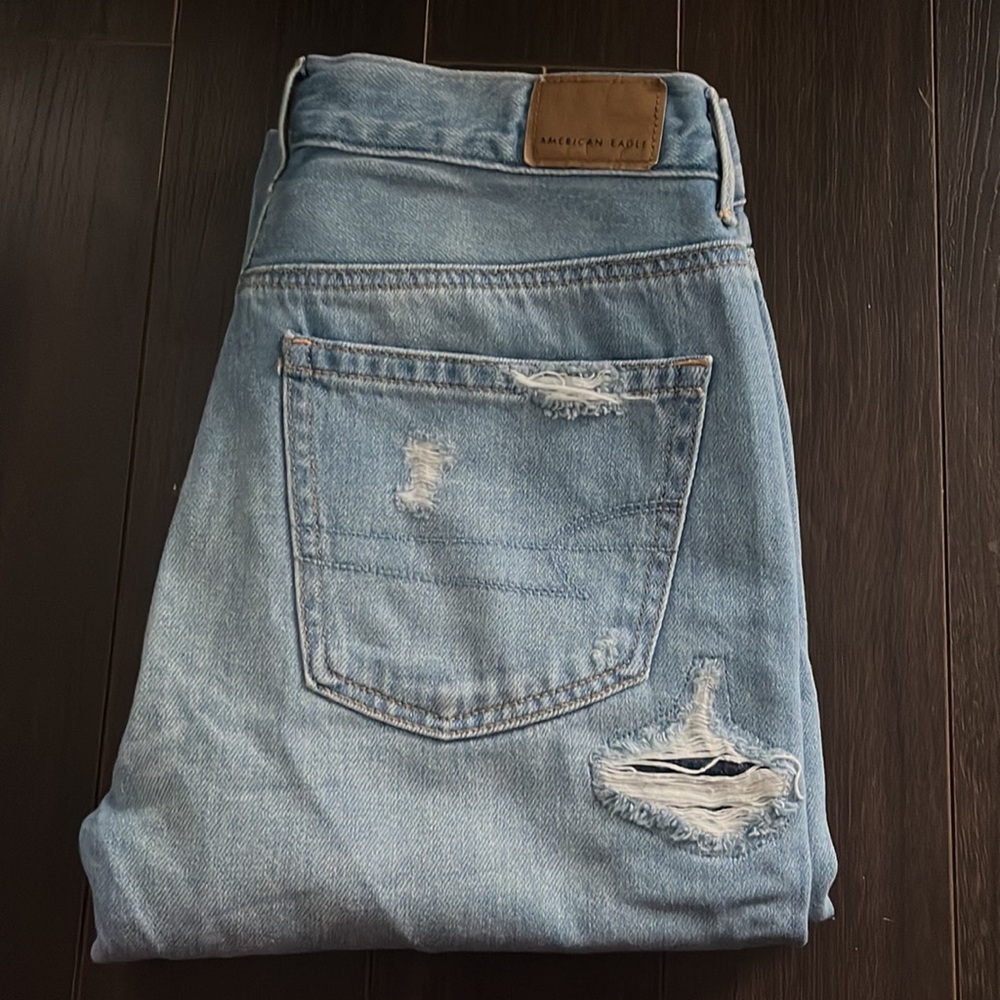 NWOT AMERICAN EAGLE high-rise Girlfriend Jeans light-wash distressed